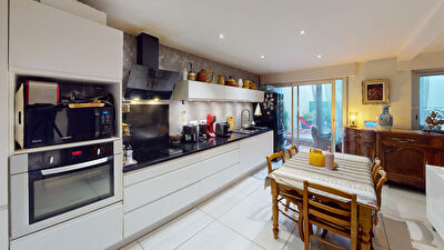Appartement T3 de 87m² en rez-de-jardin avec parking et cellier