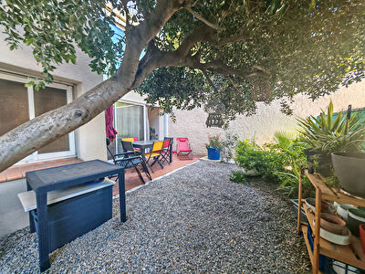 Appartement T3 de 87m² en rez-de-jardin avec parking et cellier
