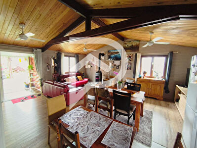 Maison chaleureuse avec un beau jardin