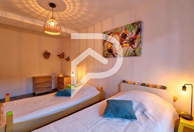 DANS MAISON APPARTEMENT EN DUPLEX TYPE 3 DE 65.77 M2 LUMINEUX AU CALME