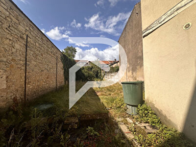 Appartement avec local situé au rez-de-chaussée