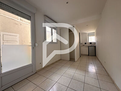 Appartement avec local situé au rez-de-chaussée