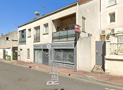 Spacieux appartement T2 avec deux balcons et stationnement - Plein coeur de la commune