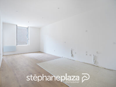 Appartement T3 neuf - Centre ville