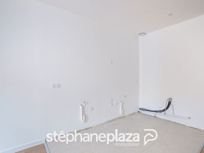 Appartement T3 neuf - Centre ville