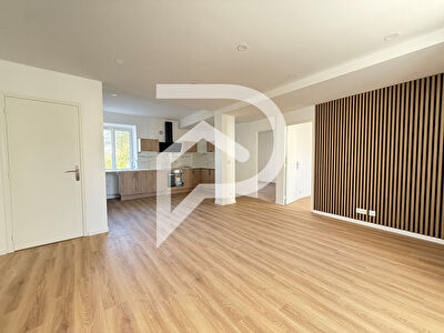 Appartement F3 en rez-de-jardin avec jardin privatif