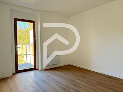 Appartement F3 en rez-de-jardin avec jardin privatif
